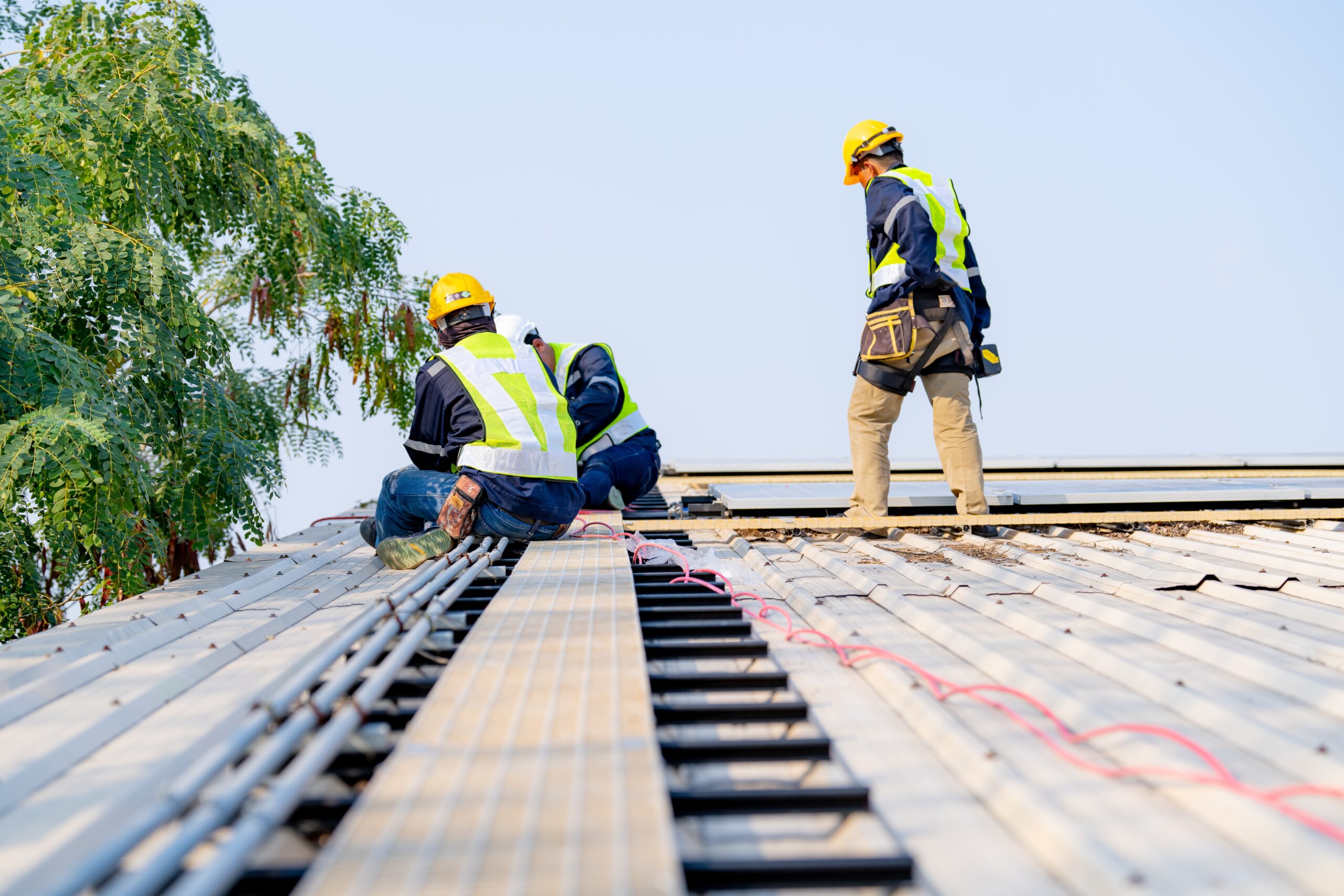 solar-panel-installation-team-on-a-rooftop
